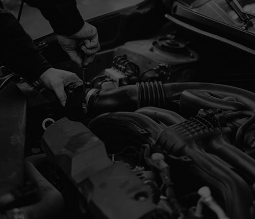 washed out image of engine technician